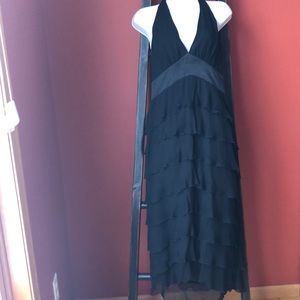 Silk halter dress with tiered bottom.